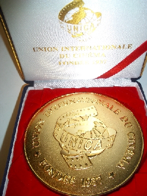 The UNICA Medal  in a presentation box.