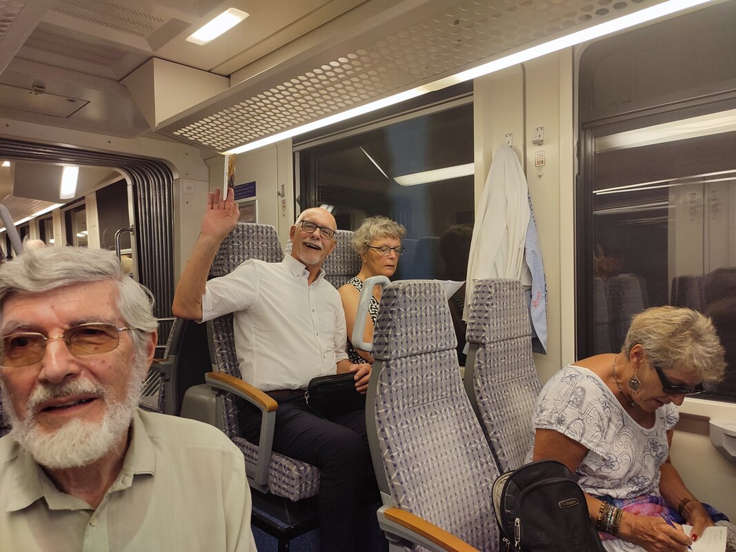 Picture on train back to Locarno. Jim Walker, Jan Essing and Ineke Essing.